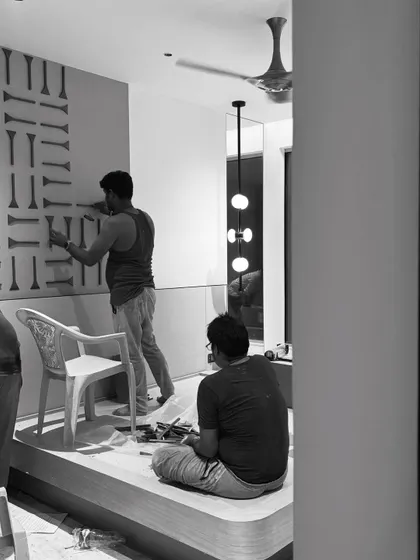 The 3D wall panel being installed. These behind-the-scenes moments show the effort and precision that go into creating our designs.