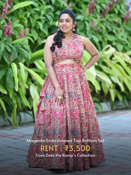 This magenta embroidered top and bottom set is a comfortable and chic option for Navratri celebrations.