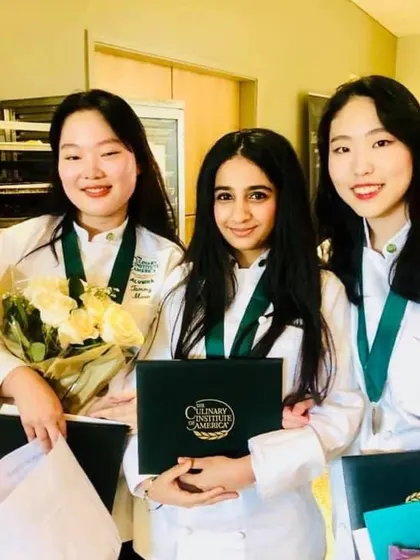 A photo from my graduation at the Culinary Institute of America with my friends. This is where my professional journey began.