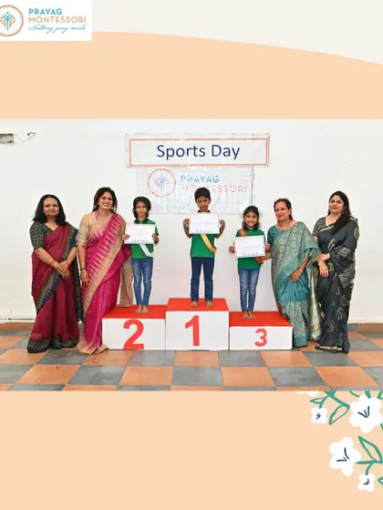 A group of winners on the podium at our JP Nagar branch, beaming with pride.