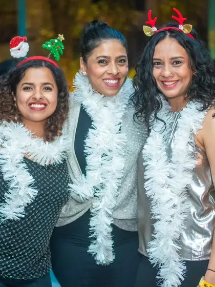 Christmas cheer with the La Rumba crew! Themed nights are always a great excuse for fun group photos and festive accessories.