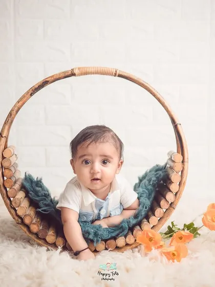 Look who's sitting up. We capture these important milestones with simple, clean setups that keep the focus on your baby's latest achievement.