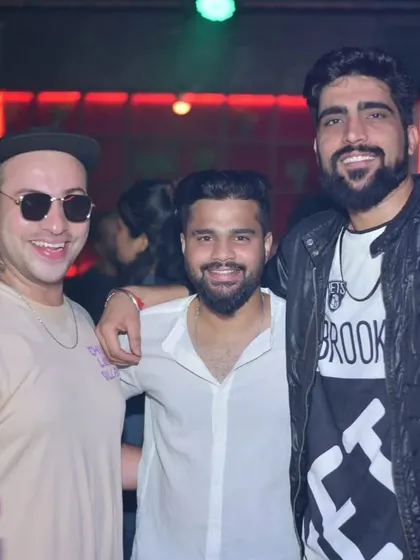A group of friends enjoying the night. My goal is to play music that brings everyone together on the dance floor.