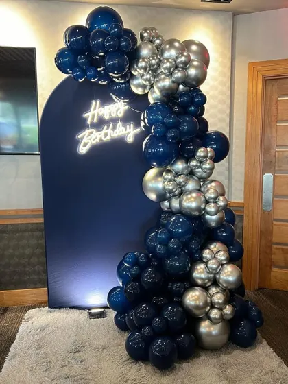 The full view of the navy and silver backdrop without the plinth, showcasing a clean and modern look for any stylish celebration.