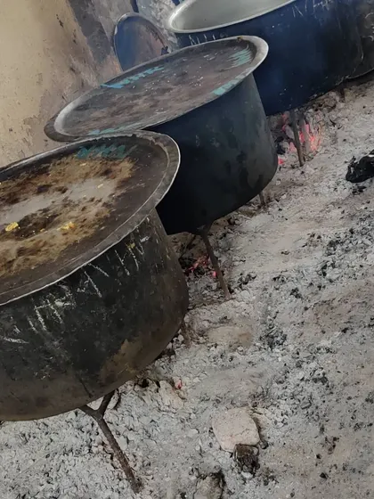 After the initial cooking, the deghs are left on hot embers for the final 'dum' process, which makes the biryani flavourful and aromatic.
