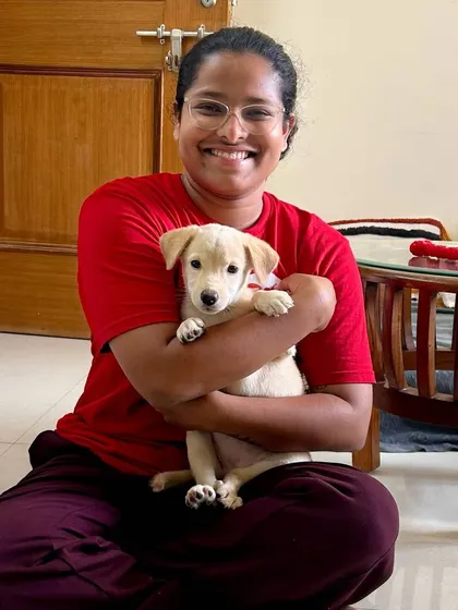 Holding this little puppy close helps build a bond of trust from the very beginning. I handle puppies of all ages, ensuring they get the socialization and care they need.