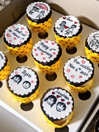 These anniversary cupcakes tell a love story through cute, hand-drawn stick figures on fondant. Each one marks a different milestone, from the day they met to their wedding day.