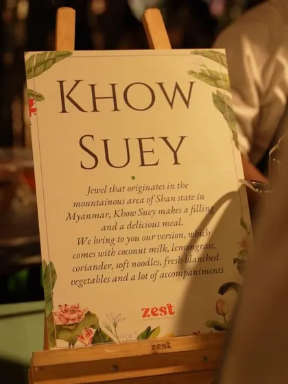 The menu for our Khow Suey station, detailing the fresh ingredients and accompaniments.