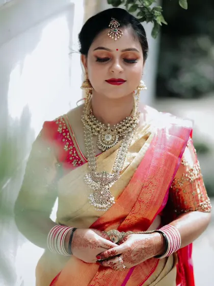 A close-up of the intricate Victorian-style jewellery worn by my client. The detailed craftsmanship and stone work are designed to give a luxurious look for any grand occasion.