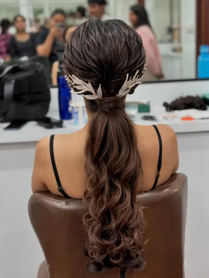 The reflection in the mirror captures the glamour of this modern hairstyle, perfect for making a statement.