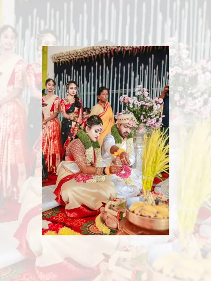 A beautiful moment from a South Indian wedding ritual, with the couple seated and surrounded by family and tradition.