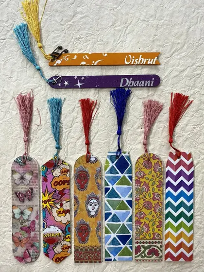 A collection of my colorful bookmarks, including some that are personalized with names.