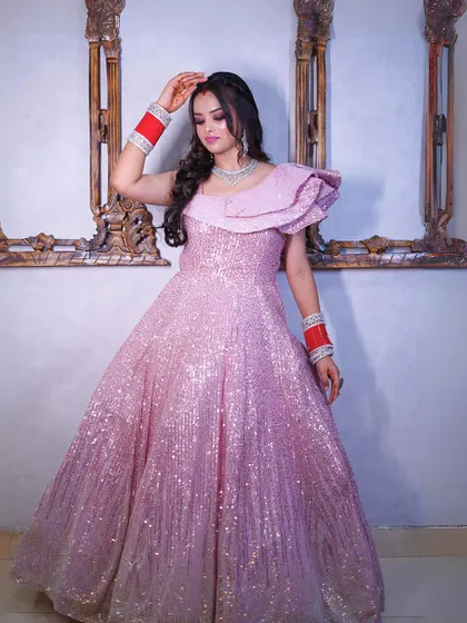 A full-length shot of the pink sequin gown, a perfect choice for a reception or cocktail party.