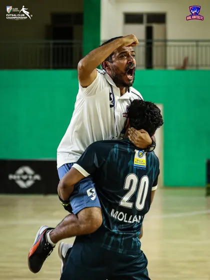 A heartfelt embrace between player and coach, a moment that captures the bond we share.