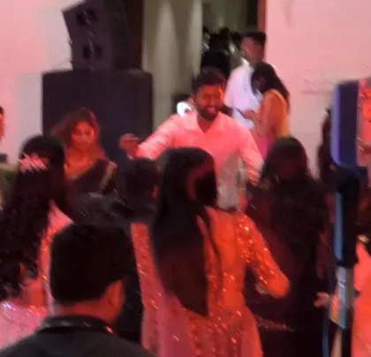 A Tamil wedding cocktail dinner with an energetic crowd.