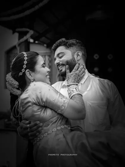 A beautiful black and white close-up of the couple, capturing an intimate and loving expression.