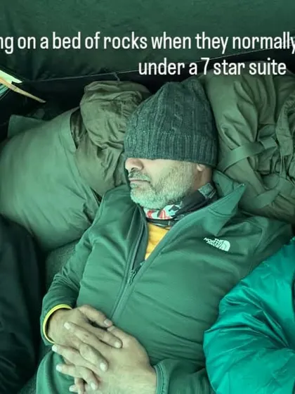 Sleeping on a bed of rocks when you're used to a 7-star suite. The mountains teach you humility and the joy of simple things. This is the real vibe of an expedition.