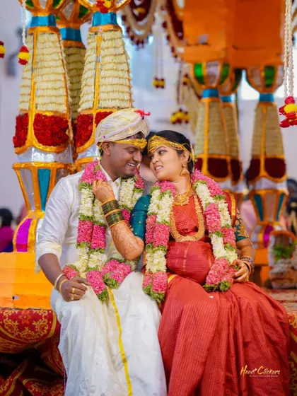 A sweet, candid interaction between the bride and groom during their South Indian wedding ceremony. These are the moments that tell your unique love story.