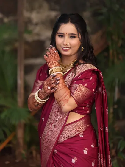 A lovely outdoor portrait. The natural-looking makeup is perfect for any lighting, ensuring the bride looks her best throughout the day.