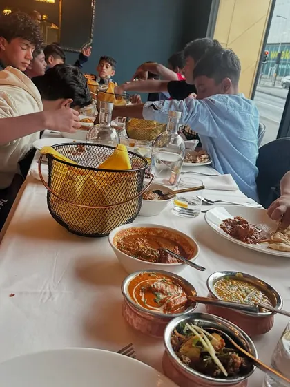 A table full of delicious Indian food. Nothing beats the comfort of home-cooked flavors.