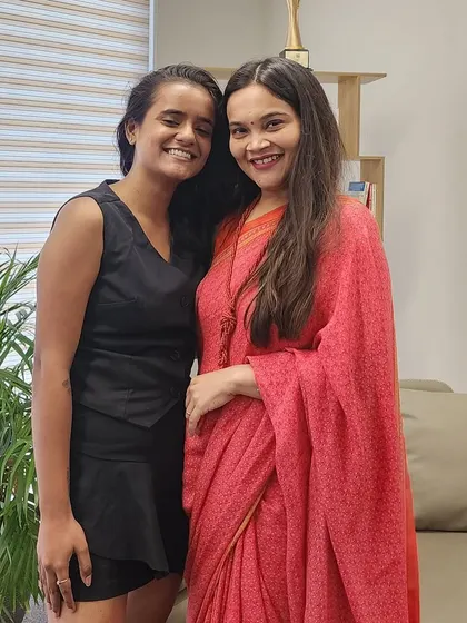 Posing with my wonderful host after a great podcast session. Connecting with others who are passionate about health and wellness is one of the best parts of my work.