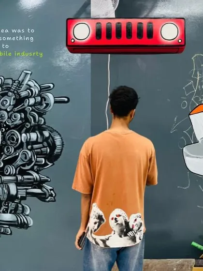 An in-progress view of the detailed engine and Jeep-grille artwork at the auto detailing studio. The idea was to create something authentic to the automobile industry with a graffiti twist.