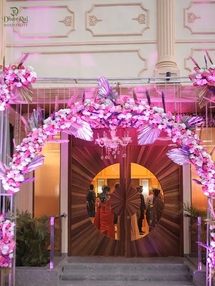 The main entrance to the Kalidas Marriage Hall, adorned with a floral arch. This is where your guests begin their journey into the beautiful celebration you've planned.