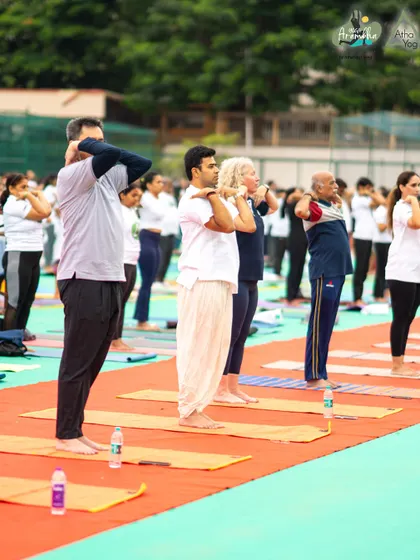 Participants of all ages and backgrounds practicing together at Yoga Aarambha. This image showcases the diversity of our community and the universal appeal of yoga.