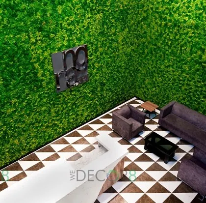 An aerial view of a reception area design concept, showing how a large moss wall can anchor the space. It demonstrates how biophilic design makes a powerful first impression on clients and visitors.