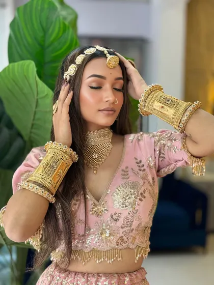 Another pose from the same series, showing the beautiful matha patti and the soft, glowing makeup.
