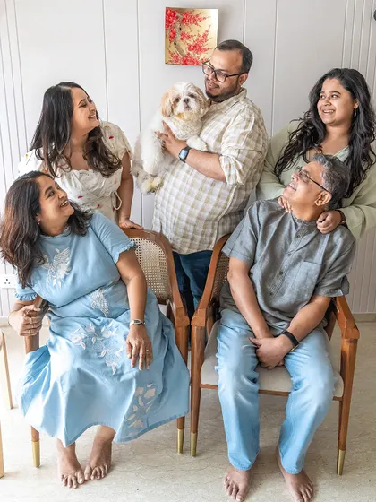 A full family portrait with Kyro the Shih Tzu, accompanied by a lovely testimonial from his mom. It was amazing how Kyro, who is usually not friendly with strangers, warmed up to me during the shoot.