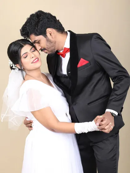 A romantic moment from the Christian wedding photoshoot. The bride's makeup is soft and natural, with a focus on glowing skin and a gentle pink lip.