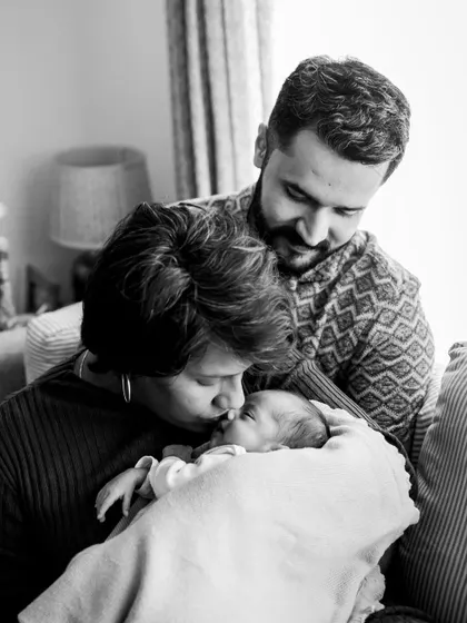 A tender kiss for the newest family member. I love using black and white to emphasize the pure emotion in these quiet, intimate family portraits.