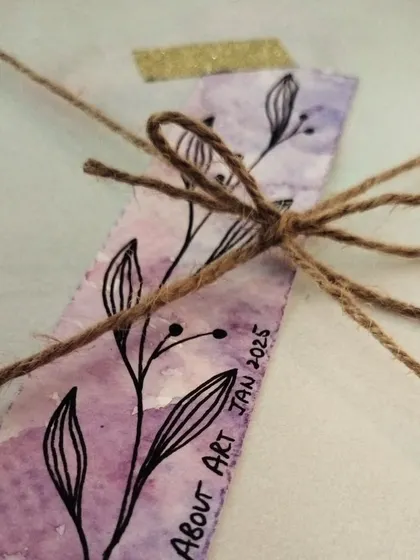 Even the smallest details are made with love. A hand-painted watercolor bookmark, tied with jute string, ready to be sent out with a larger order.