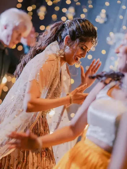 Dancing the night away. This action shot proves that good bridal makeup is not just beautiful, but also durable enough to withstand all the fun and festivities.