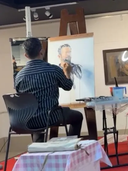 A view from behind as I work on a self-portrait demonstration for Hina Bhatt Art Ventures.