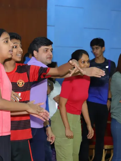 The audience and players cheering during a match at our Intra-Academy Tournament, showcasing the supportive atmosphere.