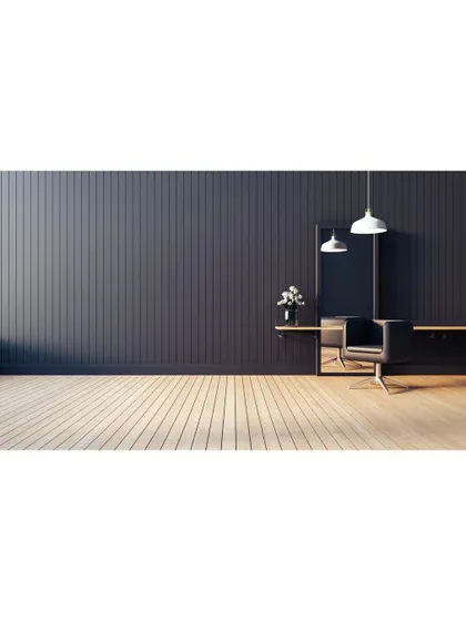 A minimalist space with a dark, paneled wall. This image showcases our ability to create a dramatic and sophisticated mood with simple elements.