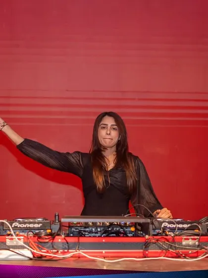 A confident pose behind the decks at the Kaavaalaa festival in Sri Lanka. This image shows my command of the stage and the audience.