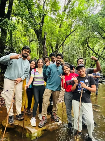 Making our way through a stream on the Kudremukha trek. It's all part of the adventure!