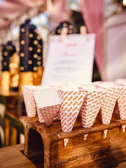 Custom-branded paper cones, demonstrating our attention to branding and detail.