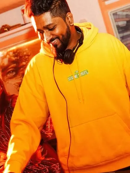 A candid shot from a high-energy night. I love feeling the music just as much as the crowd does.
