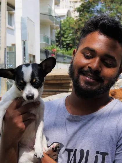 Our groomer Justin posing with the adorable Tweety. Seeing our clients happy and fresh is the best part of our day.
