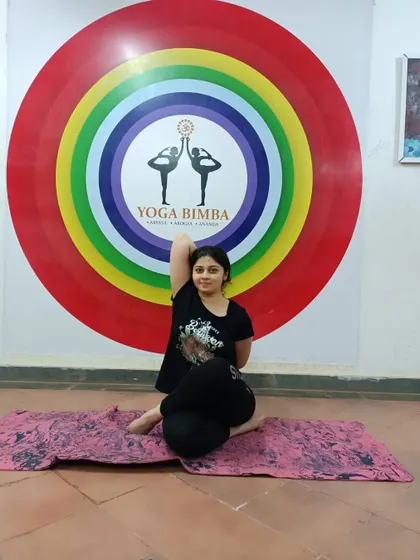 Day 8 of Navratri: Gomukhasana (Cow Face Pose). We honor Mata Mahagauri, who is pure and rides on an ox. This pose provides a deep stretch to the shoulders and hips.