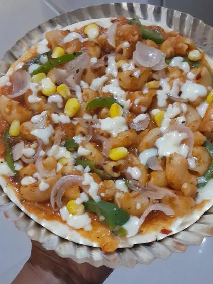 A unique Macaroni Pizza, combining two favorites into one delicious dish. This is a very popular item, especially for kids' parties.