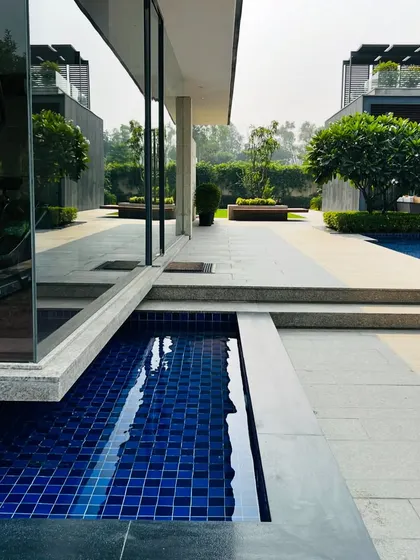 A view along the water channel that runs beside the gym, connecting different parts of the landscape and adding a dynamic element.