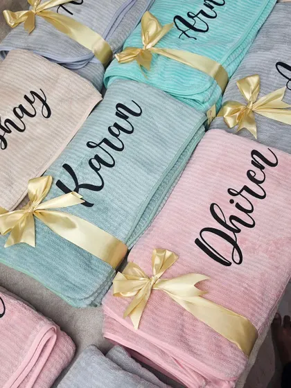 A perfect gift for self-care. These premium towels are customized with a name in a beautiful script, making them a personal and luxurious favor for wedding guests or the bridal party.