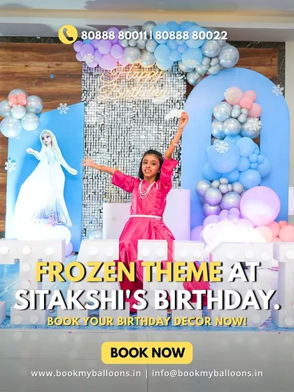 A happy birthday girl celebrates her tenth birthday with a spectacular Frozen theme, featuring a life-sized Elsa cutout, shimmering backdrops, and her name in giant marquee letters.