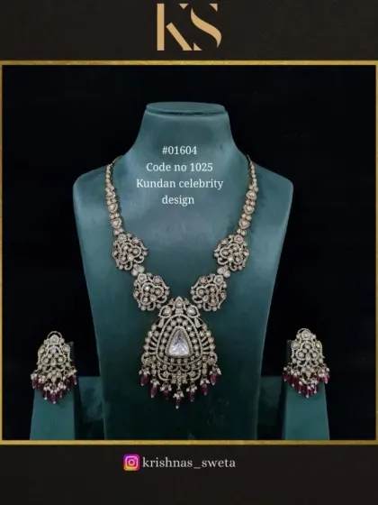 This celebrity-inspired Kundan necklace is shown with a deep ruby red color scheme, perfect for a traditional bridal lehenga.