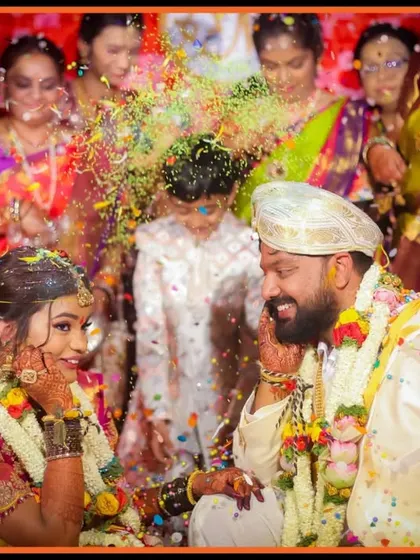 The vibrant Akshata ritual, where the couple showers each other with blessed rice. We capture the color, joy, and significance of this beautiful tradition.